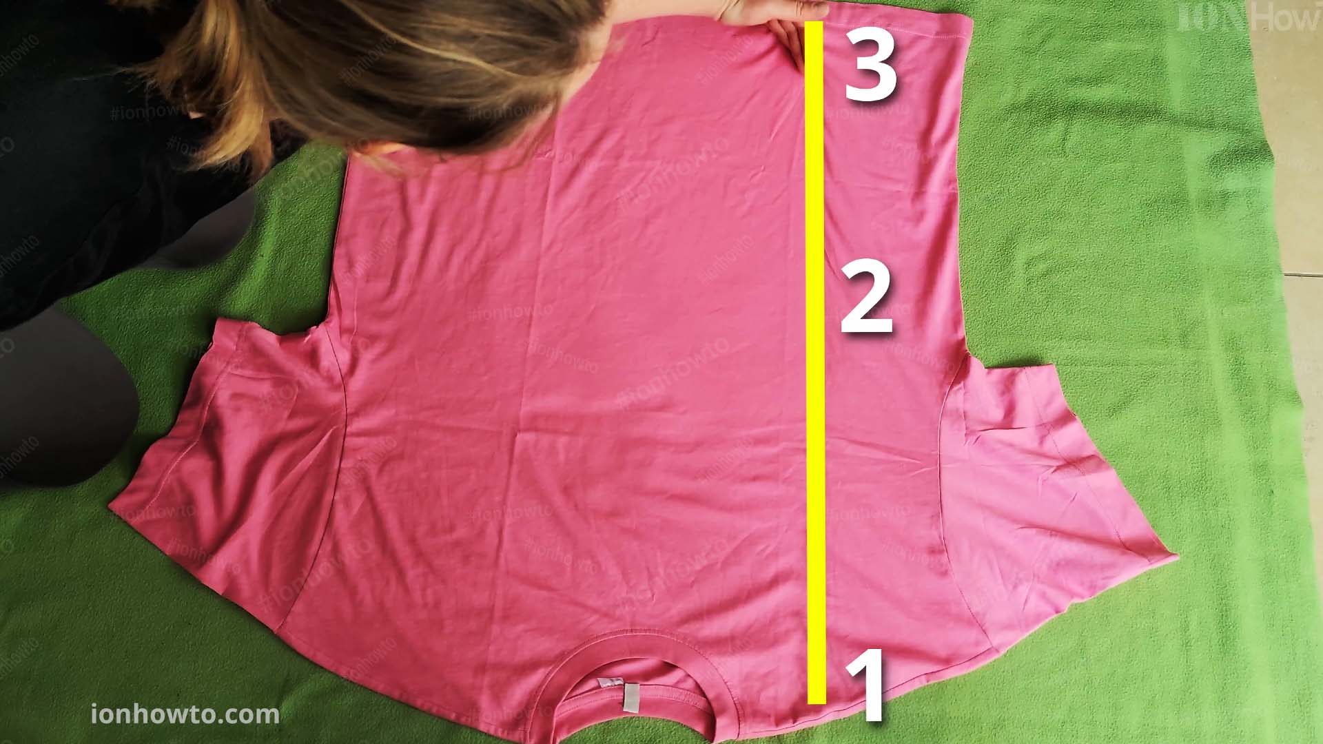 Step 1 Draw vertical imaginary line Fold a T shirt