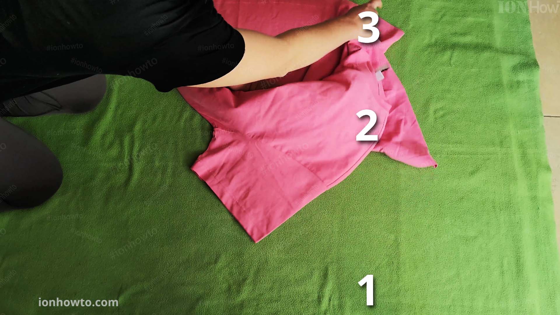 Step 4 Bring point 1 towards 3 and hold 1 and 3 Fold a T shirt